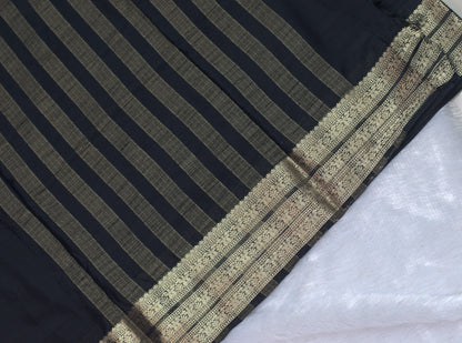 Elegant Black Viscose Georgette Saree with Gold Woven Border & Blouse Piece
