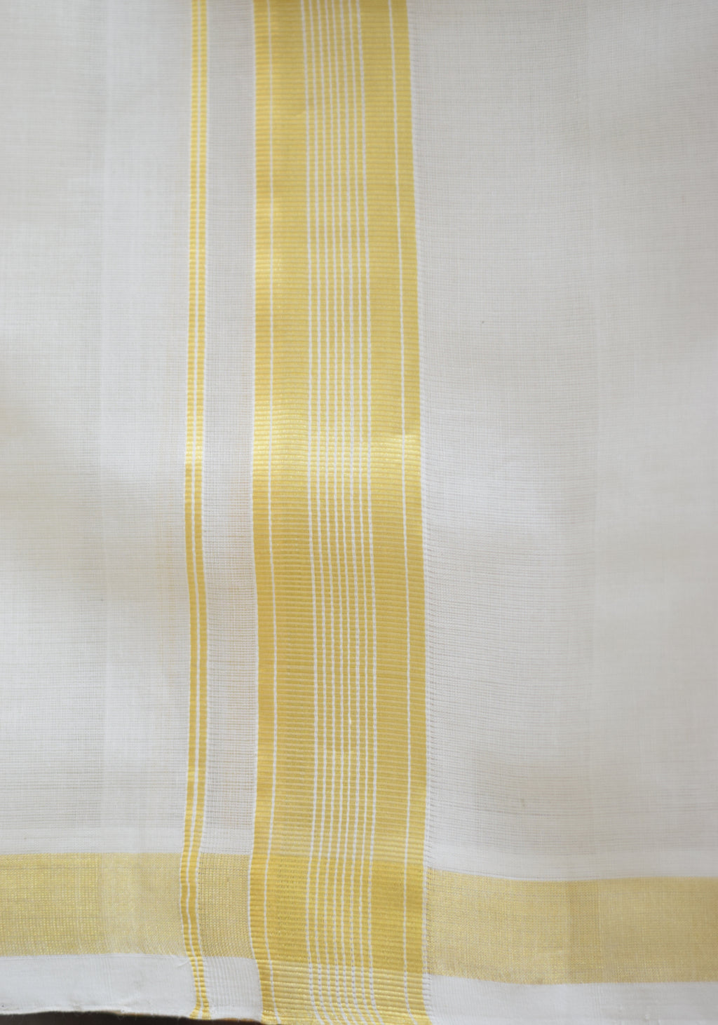 Traditional White Cotton Dhoti with Golden Border. Bouble.