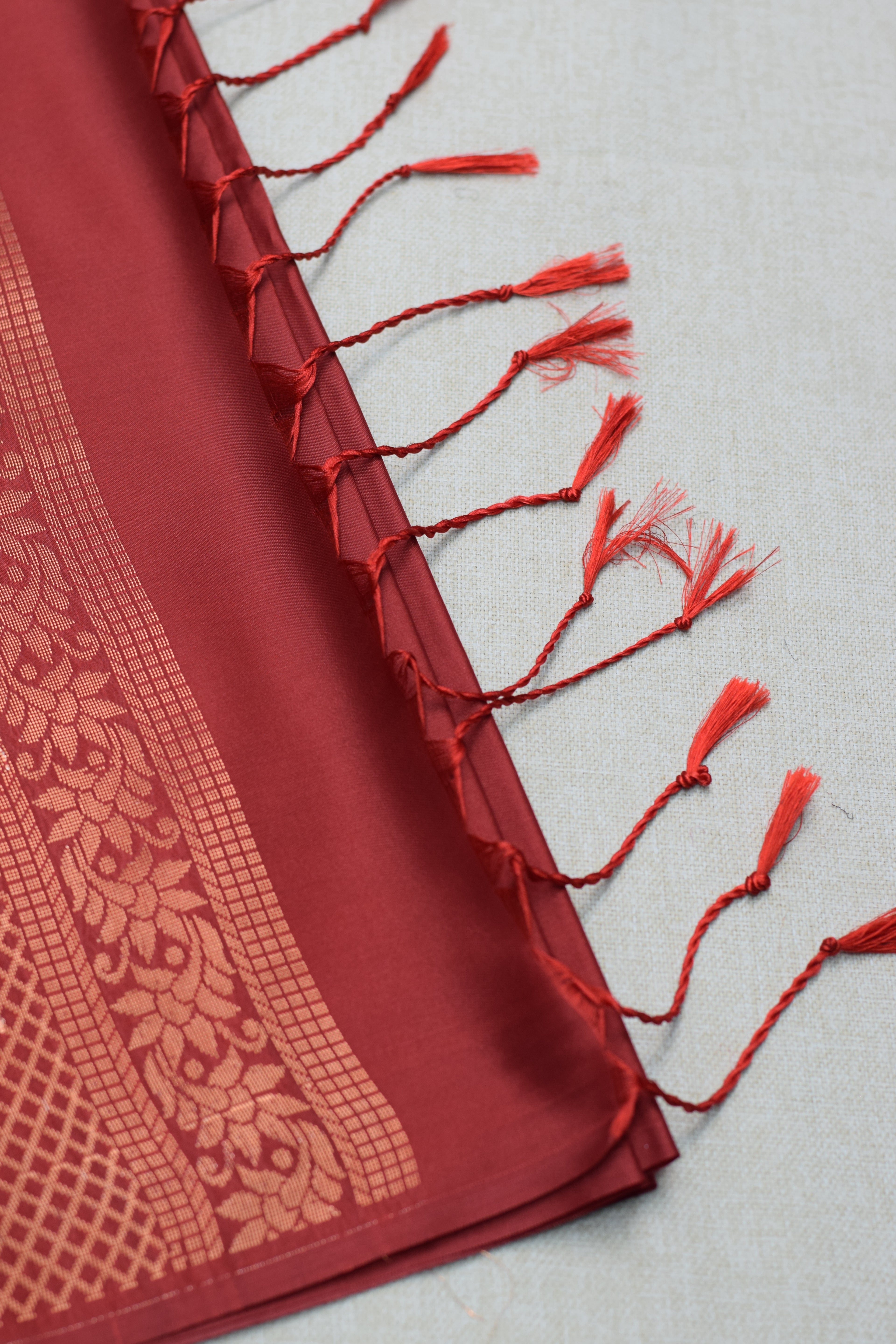Elegant Maroon Semi Silk Saree with Woven saree Border & Tassel Pallu