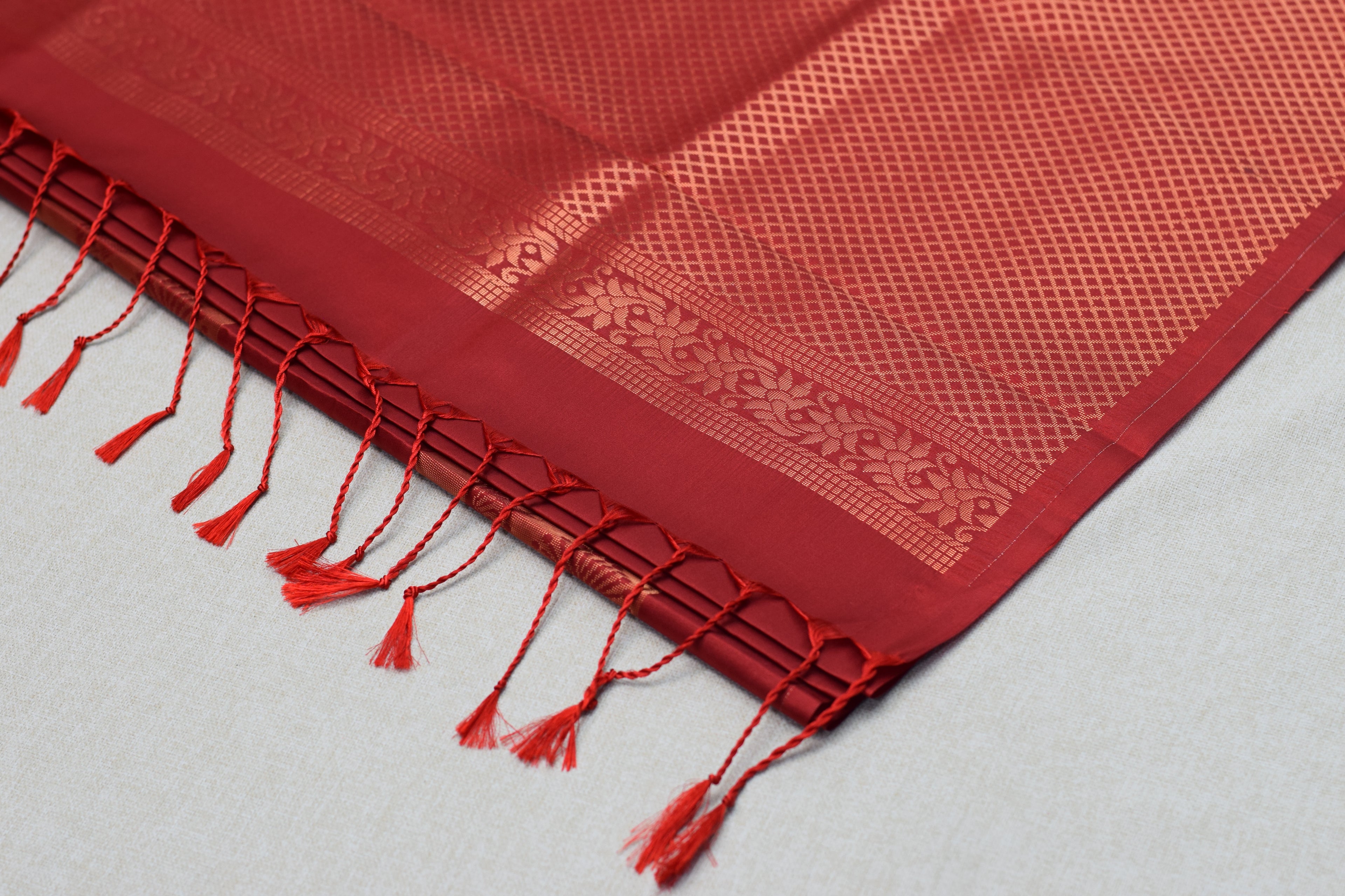 Elegant Maroon Semi Silk Saree with Woven saree Border & Tassel Pallu