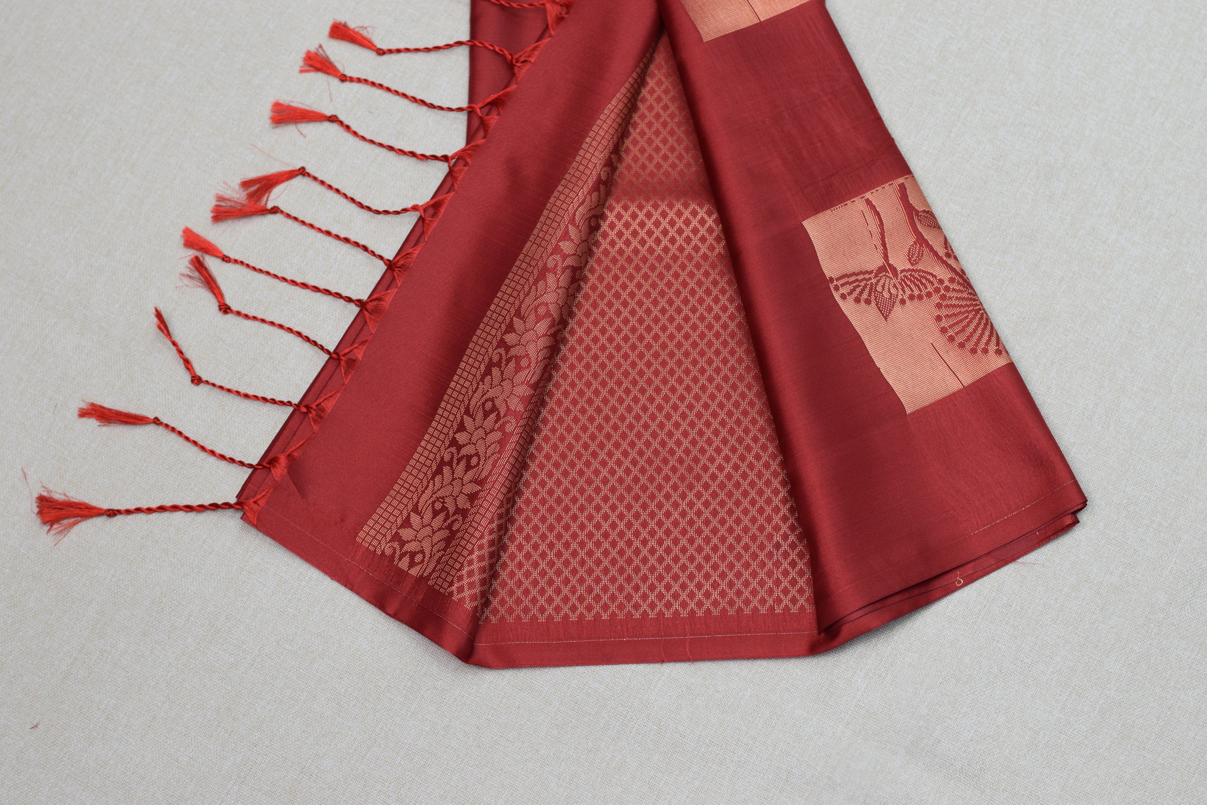 Elegant Maroon Semi Silk Saree with Woven saree Border & Tassel Pallu