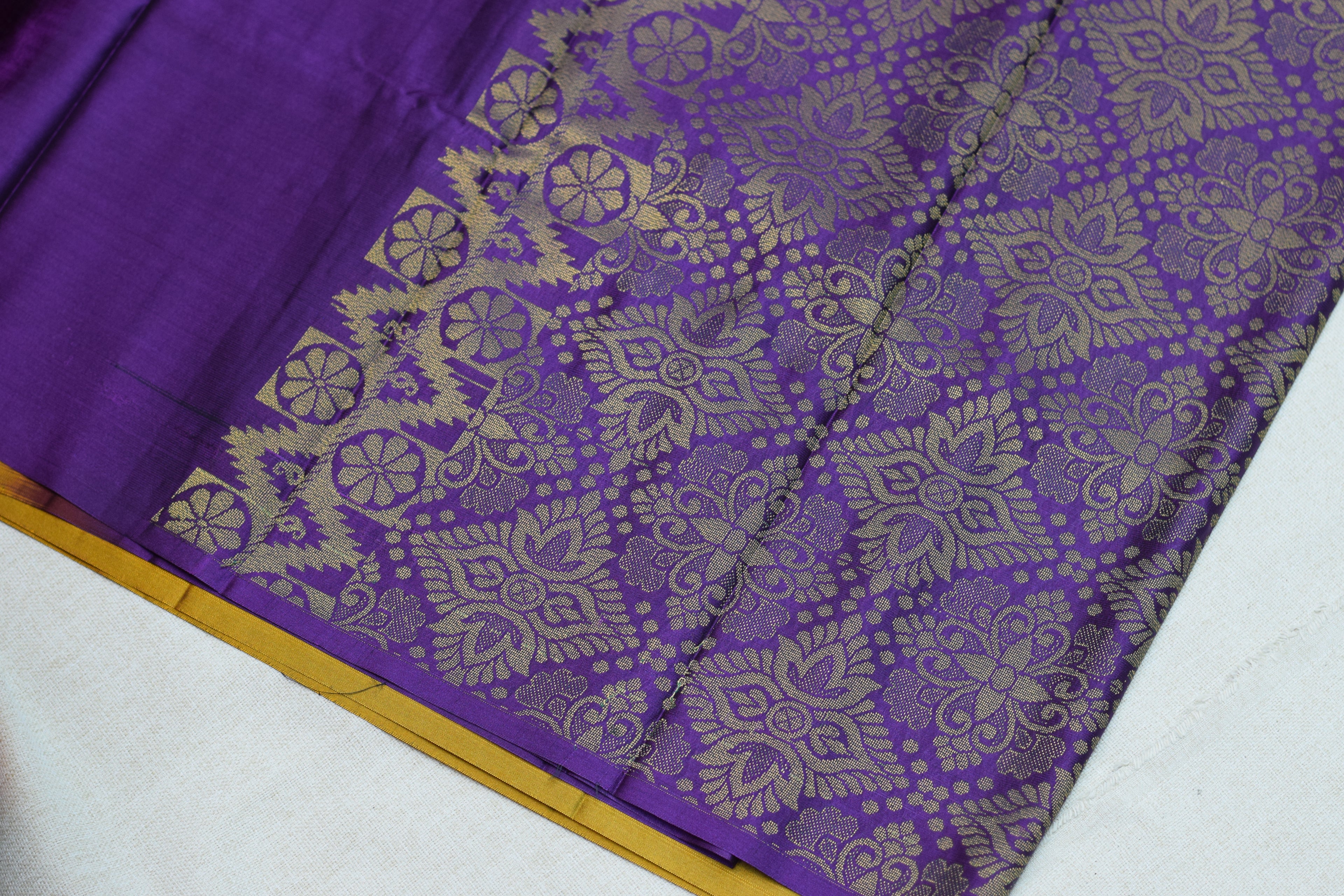 Elegant Mustard & Royal Purple Semi Silk Saree with Gold Zari Floral Weaving