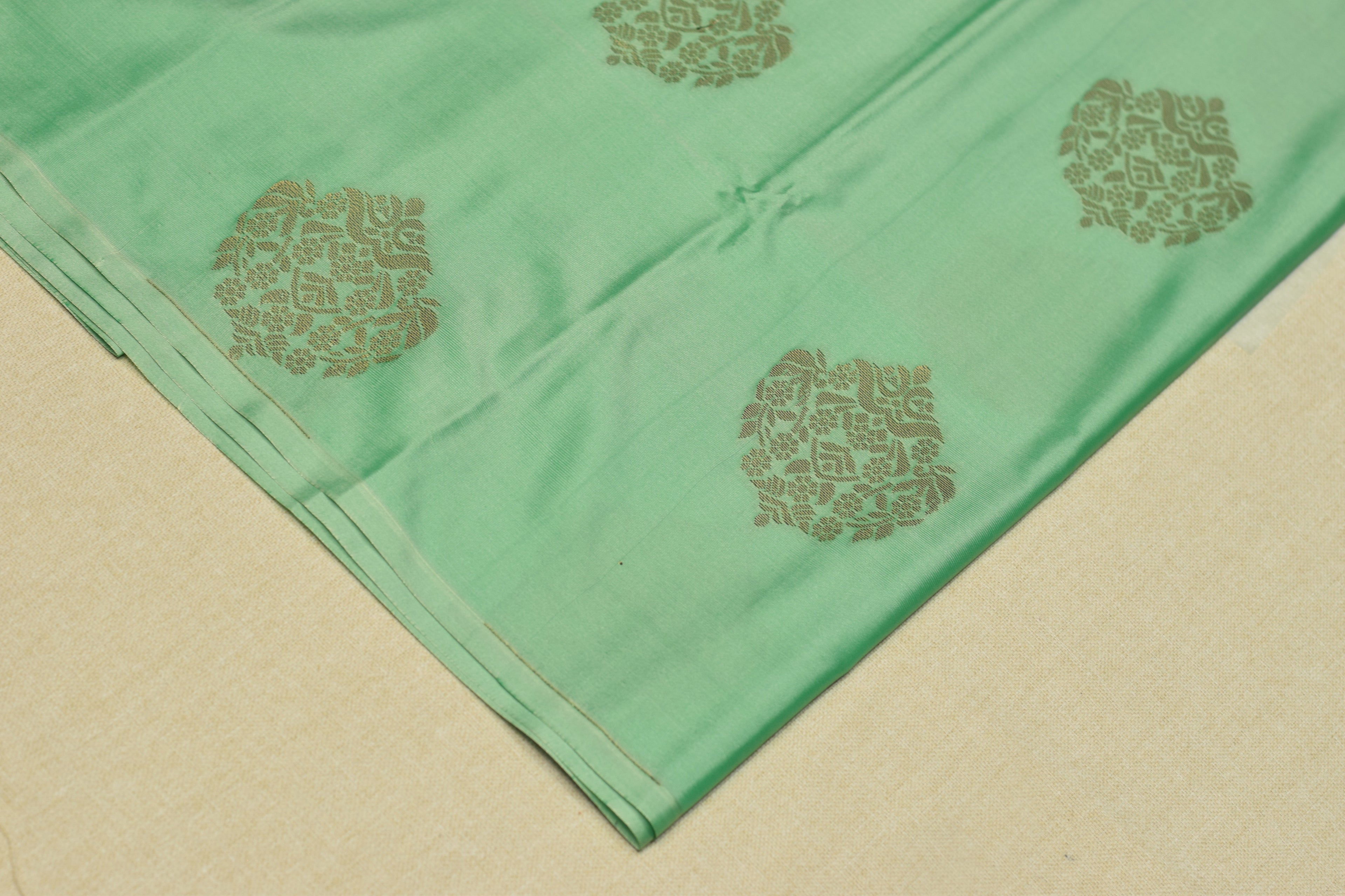 Elegant Sea Green Semi Silk Saree with Gold Woven Motifs