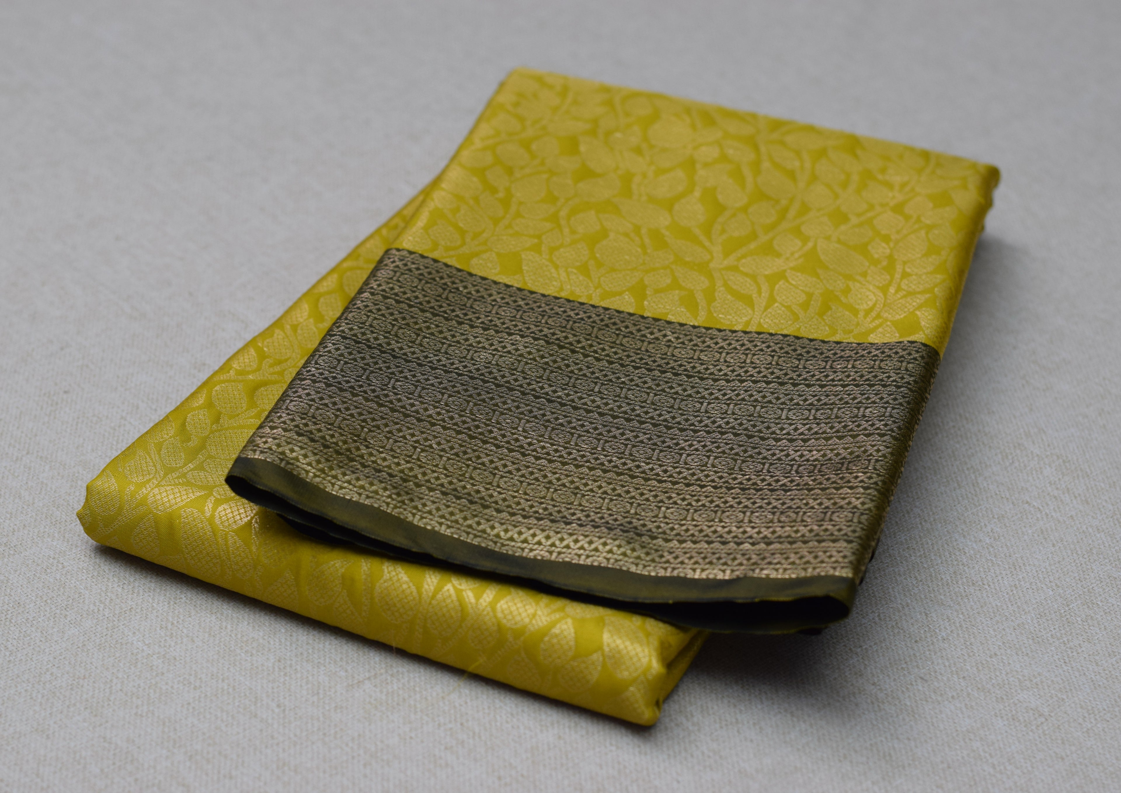 Elegant Yellow Cotton Silk Saree with Subtle Leaf Weave & Contrast Border