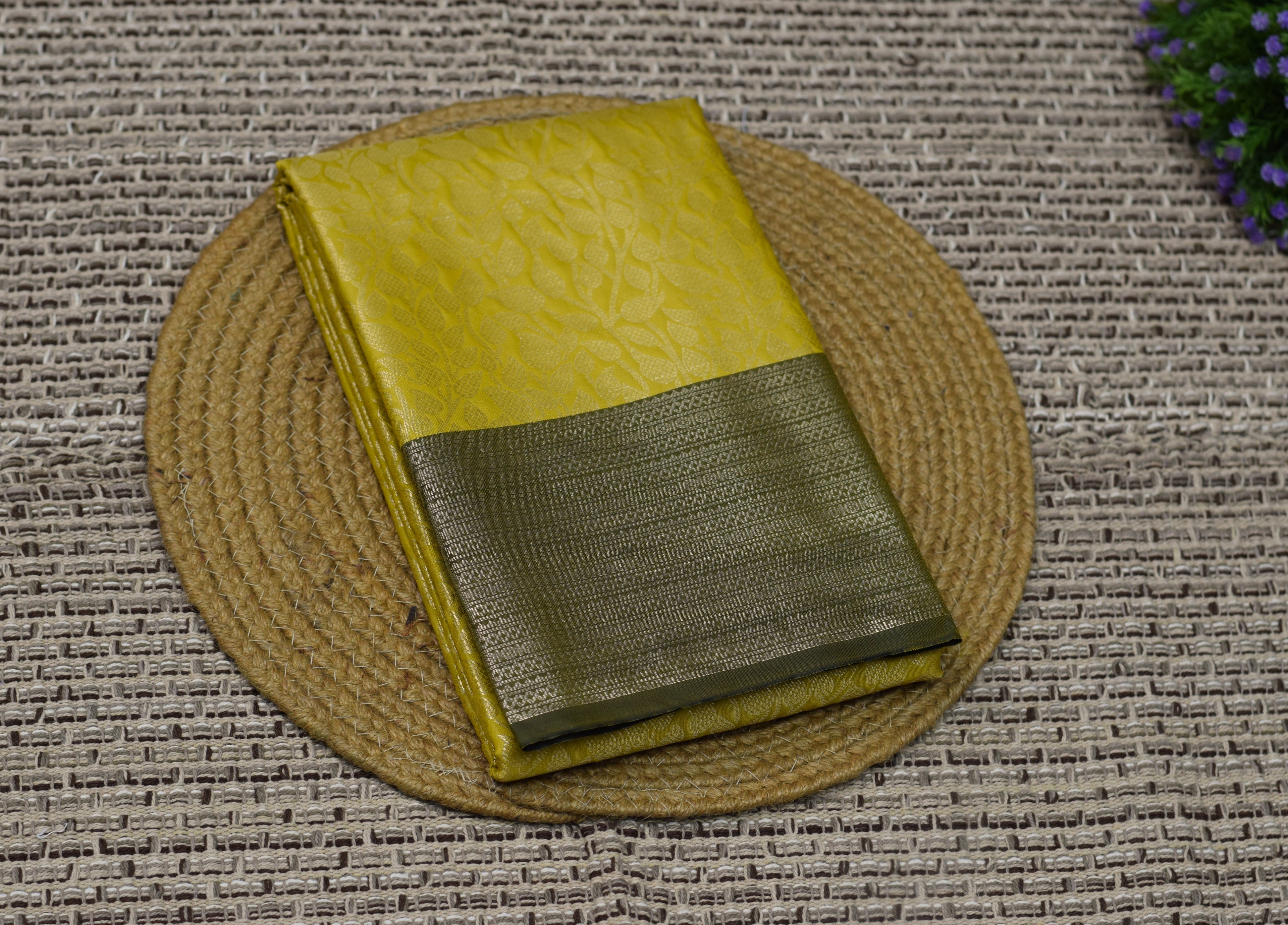 Elegant Yellow Cotton Silk Saree with Subtle Leaf Weave & Contrast Border