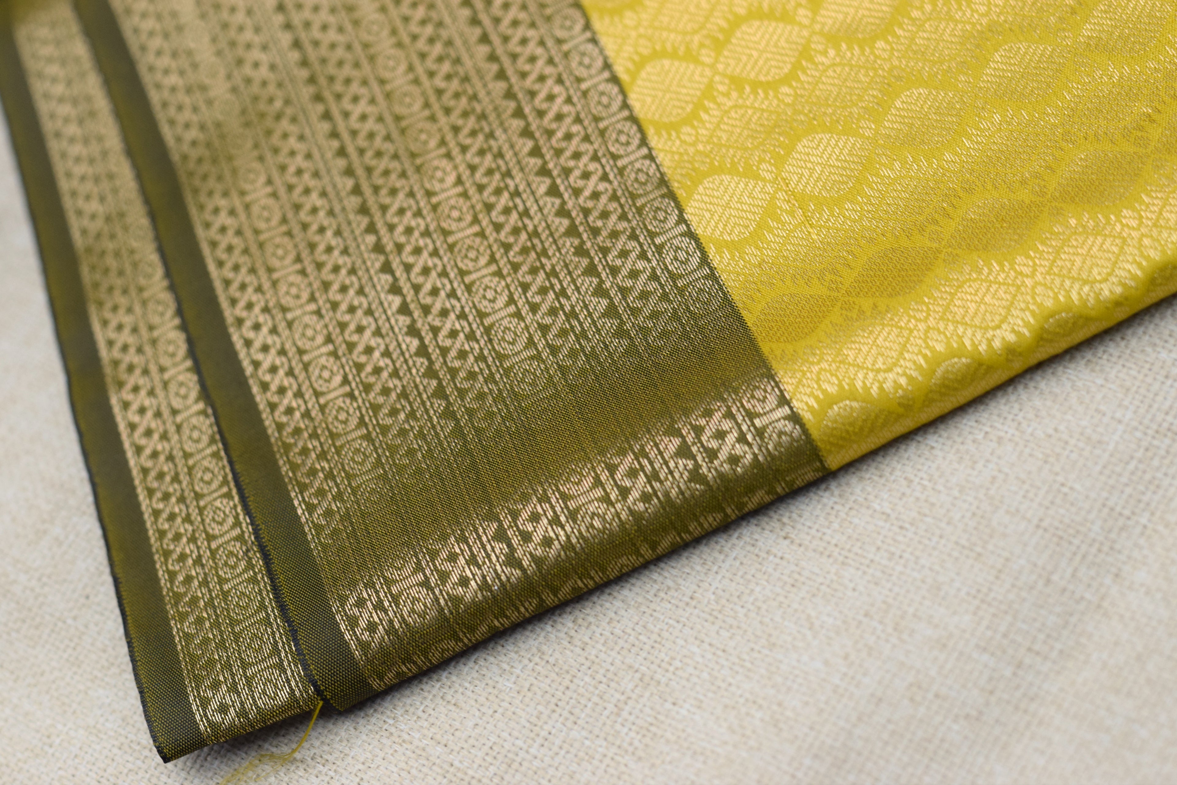 Elegant Yellow Cotton Silk Saree with Subtle Leaf Weave & Contrast Border