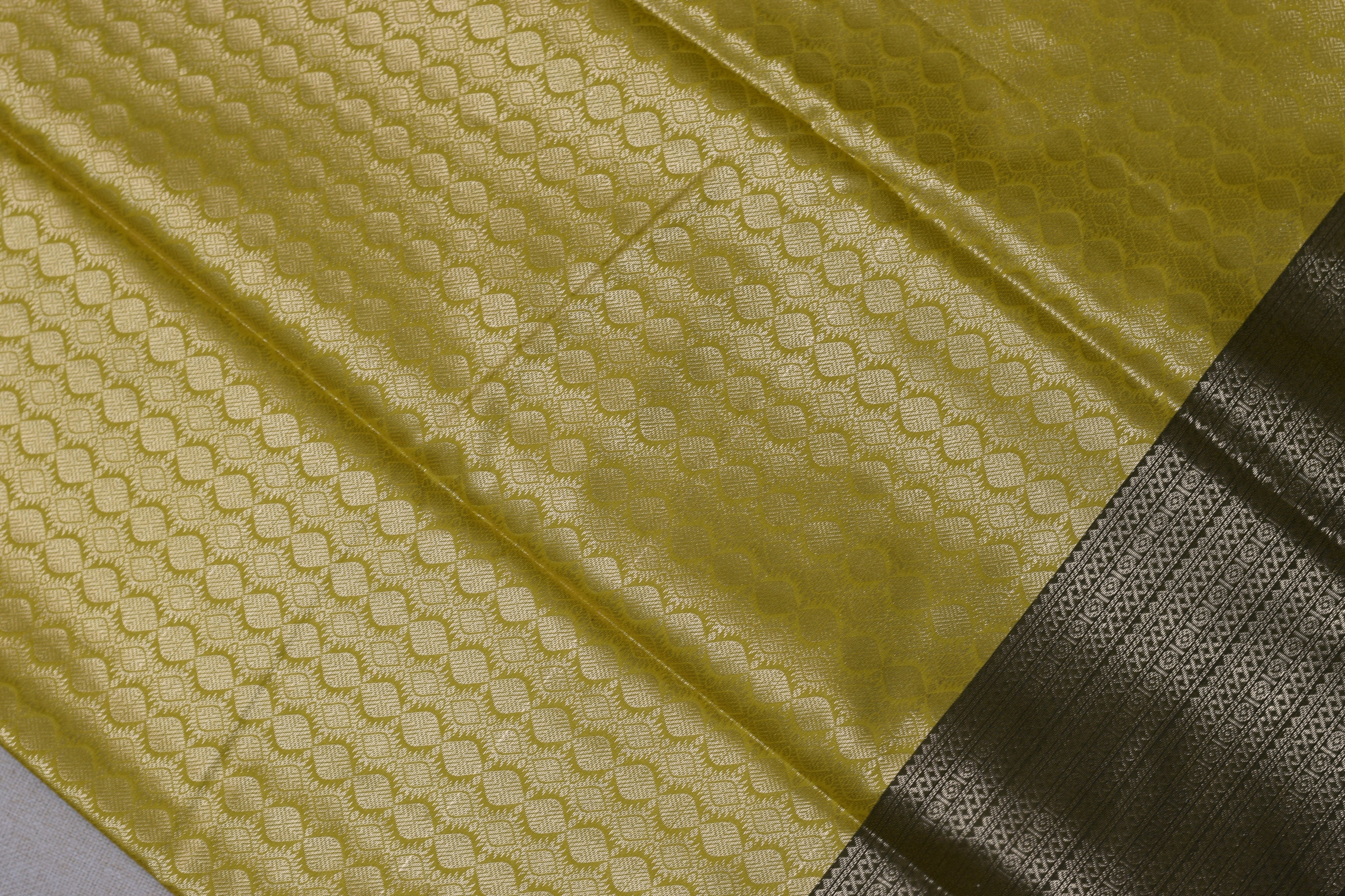 Elegant Yellow Cotton Silk Saree with Subtle Leaf Weave & Contrast Border