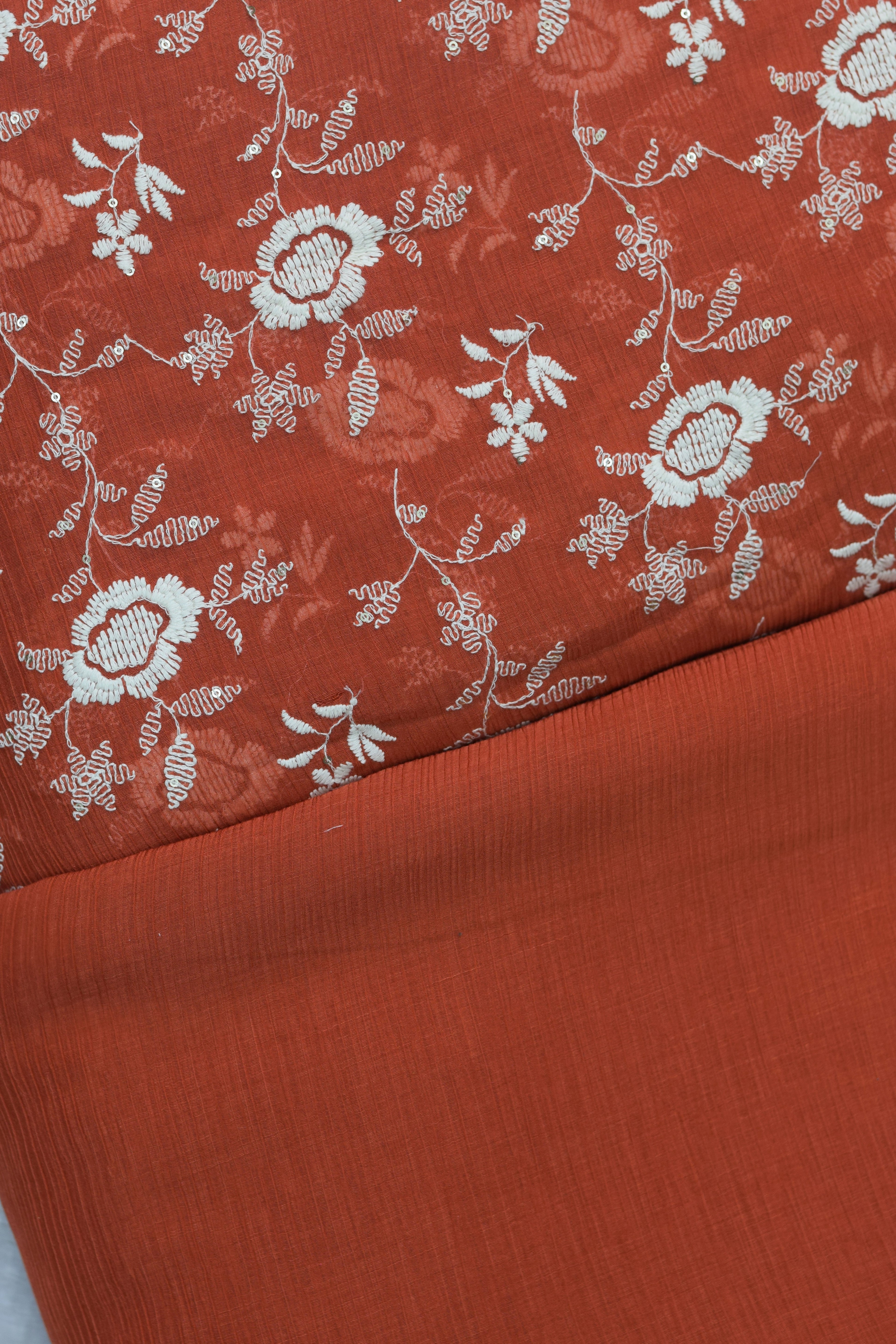 Rust Orange Crushed Georgette Fabric with Elegant White Floral Embroidery – - 44 Inches Width